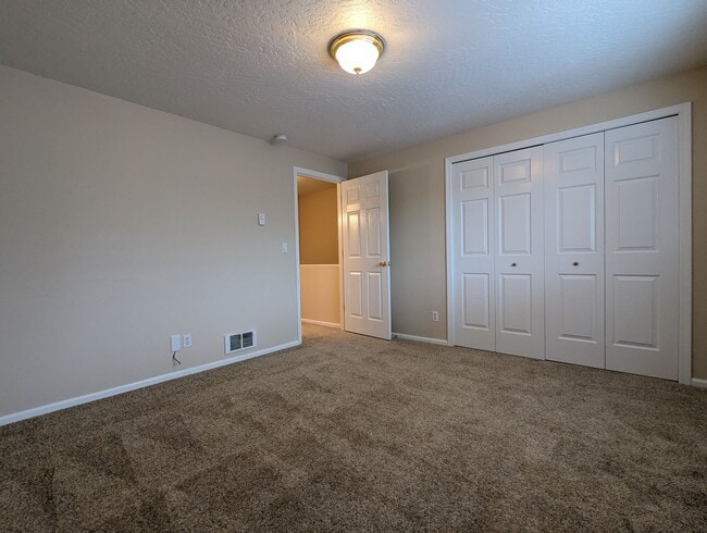 Building Photo - Beautiful 2-Bedroom, 1.5-Bath Condo. Landscaping included!