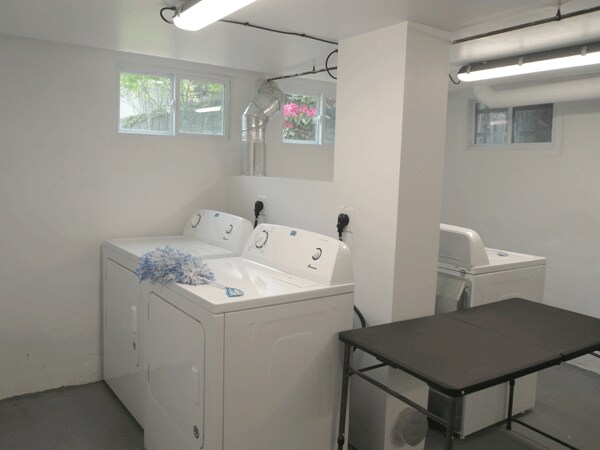 Dedicated washer and dryer in basement laundry room - 40 Lyon St