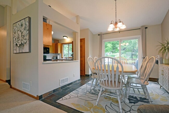 Building Photo - Spacious 3-Bedroom with Walkout and Fully Fenced Yard in Eagan