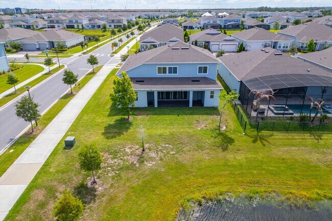 Building Photo - Immaculate Executive Home in Isles of Lake Nona