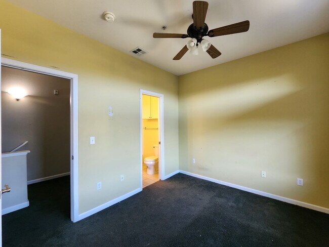 Building Photo - Modern 2BR/2.5BA Condo with Ensuite Bathro...
