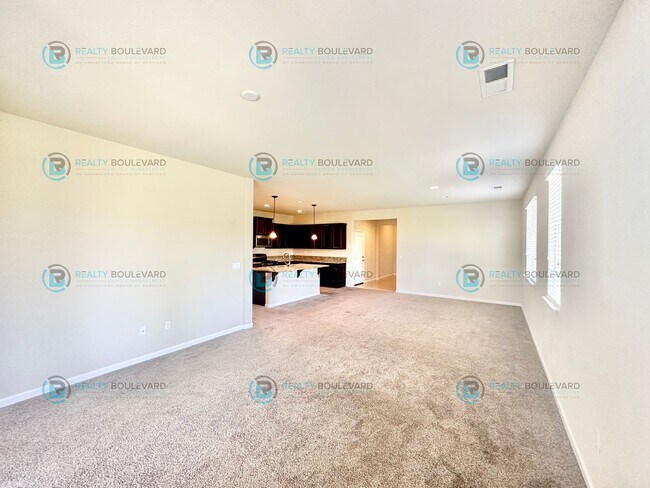 Building Photo - 3 Bedroom 2 Bathroom with Garage covered patio and beautiful yard!