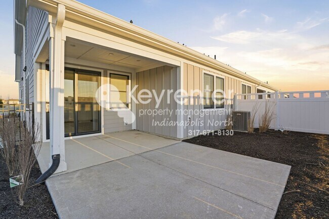 Building Photo - Located in Westfield, IN, this attractive 3-bedroom, 2.5-bath home sits on a corner lot within an...