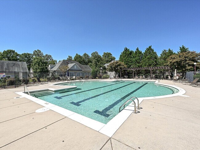 Building Photo - Stylish Condo Living with Open Concept, Garage & Outdoor Space