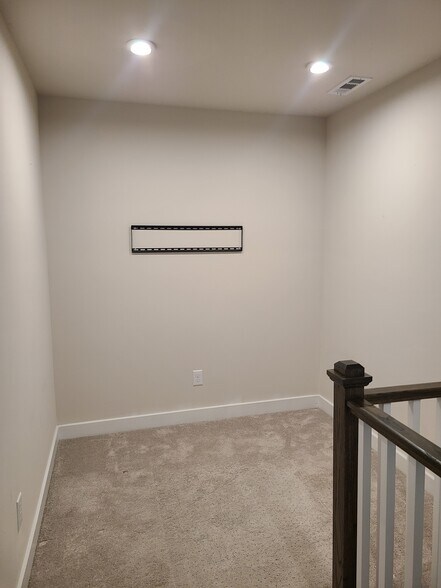 Office area with extra outlets and lighting, plus a monitor mount. - 1430 Carderock Springs Dr