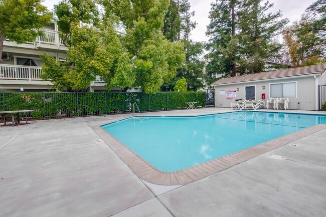 Building Photo - Refreshed 2/2 Second Floor Campbell Condominium in Great Location! Attached Garage & Additional S...