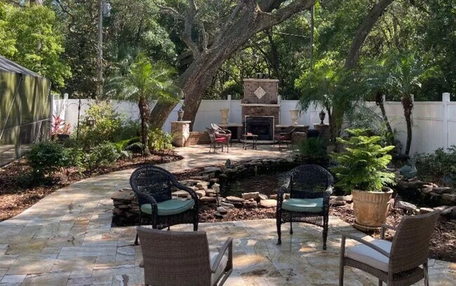 Building Photo - Welcome to this private retreat offering the perfect blend of luxury space and outdoor living.