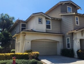 Building Photo - Two Story 3 Bedroom Townhome with 2 Car Garage in Gated Community