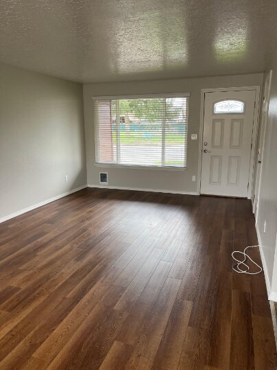 Building Photo - Updated Duplex with Garage