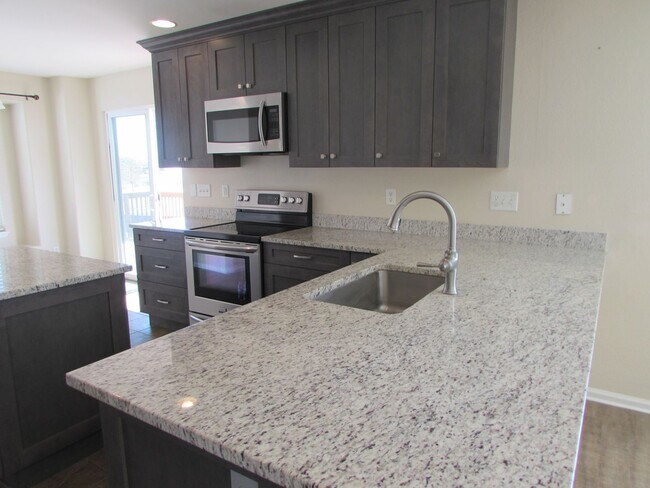 Building Photo - Beautiful 2-Story Home with 3-Car Attached...