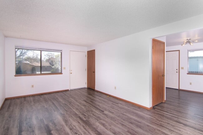 Building Photo - Updated 2 Bed 1 Bath Duplex with full basement Carport and Washer / Dryer provided