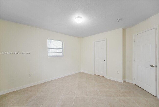 Building Photo - 6320 NW 1st Pl