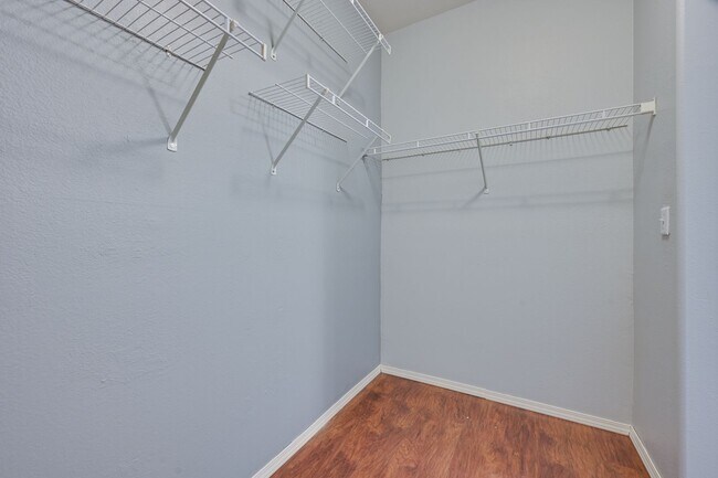 Building Photo - NW!! Gated!!! Clubhouse!!!Community Pool!!! 1st Floor Condo!!! Wood like floors!! No Carpet!!