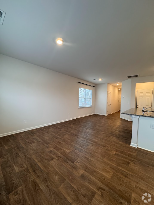 Building Photo - Stylish 3-Bedroom Townhome with Modern Ame...