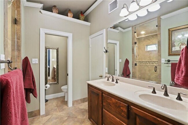 Building Photo - 4-bedroom, 1-story home with dedicated office space and large backyard!