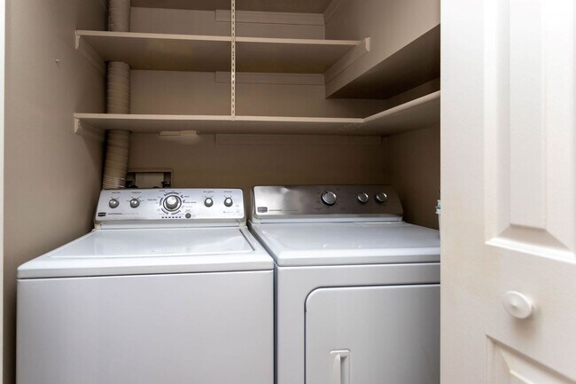Building Photo - Cozy 2-Bed Condo with Fireplace, Garage & ...