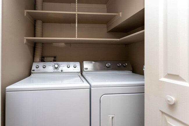 Building Photo - Cozy 2-Bed Condo with Fireplace, Garage & Pool Access Near Shopping!