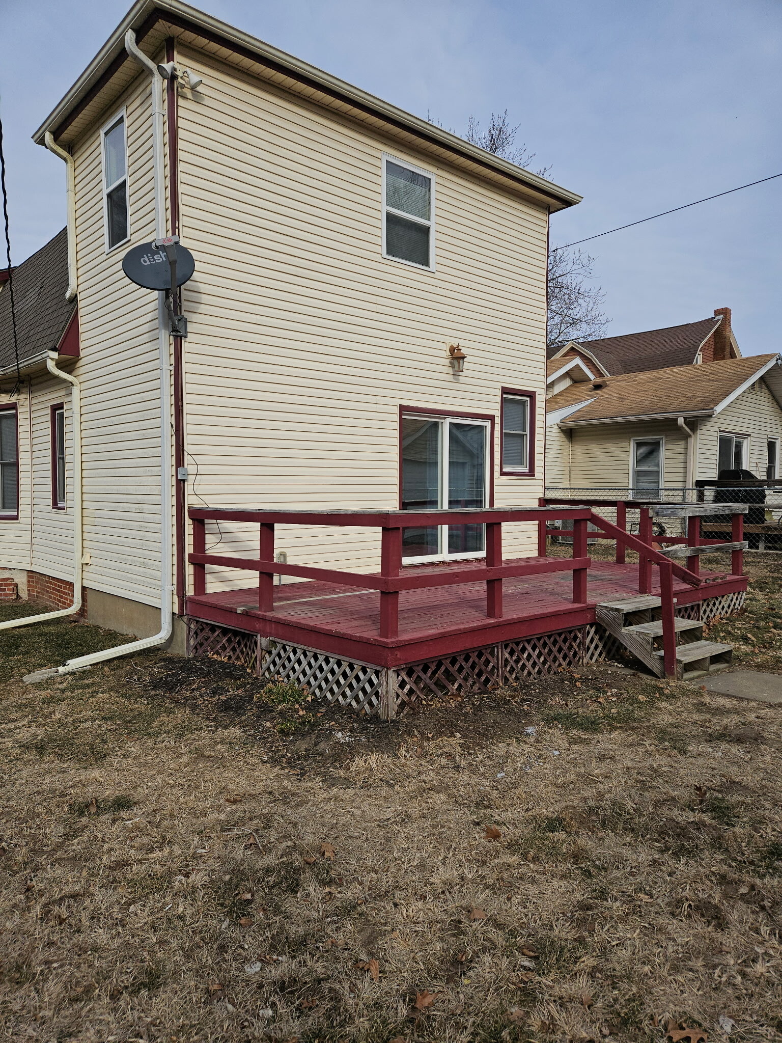Back deck with fully fenced yard. Parking via alleyway - 1214 5th Ave