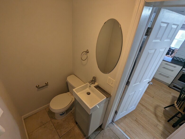 1/2 Bath off Kitchen - 1824 Fox Way