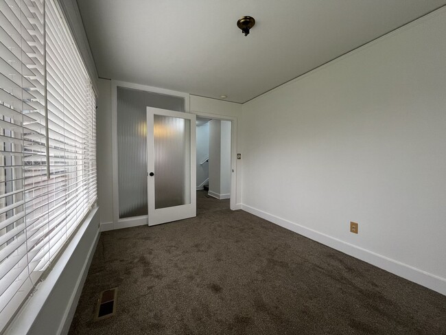 Building Photo - Expansive 4BR 2,900+ Sq Ft Home with Theater-Style Living Room & Bonus Hobby Workshop