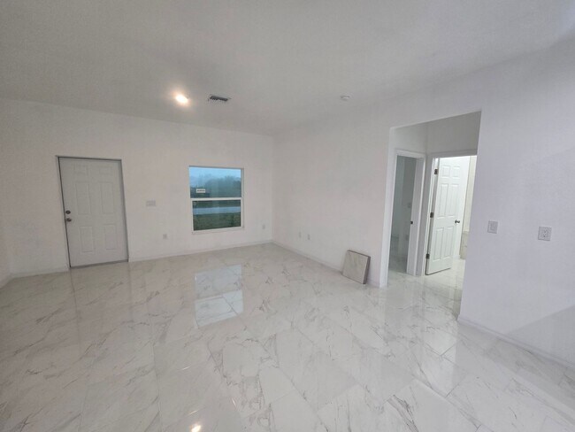 Building Photo - BRAND NEW THREE BEDROOM, 2 BATH, 1 CAR GAR...