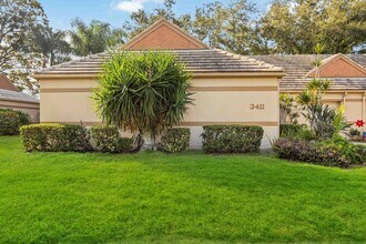 Building Photo - Beautiful Must See!! 3/2 Plus Sunroom & Garage!!  Gated Community!!