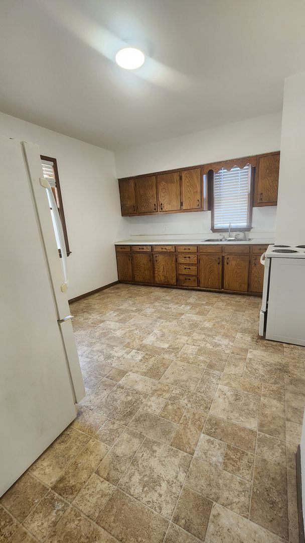 Building Photo - Rent your way to a brighter future!