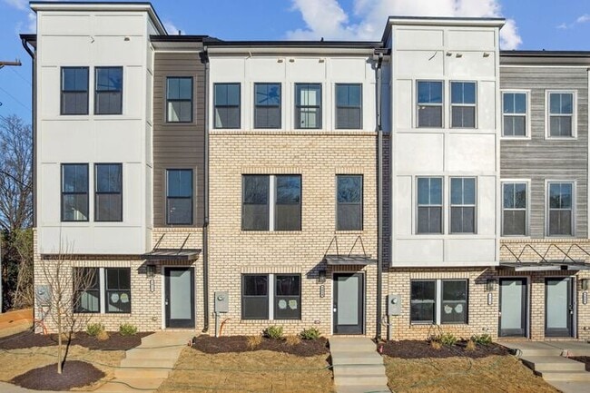 Building Photo - High-End 2BR Townhome | Rooftop Terrace + 2-Car Garage | 24-Unit Community