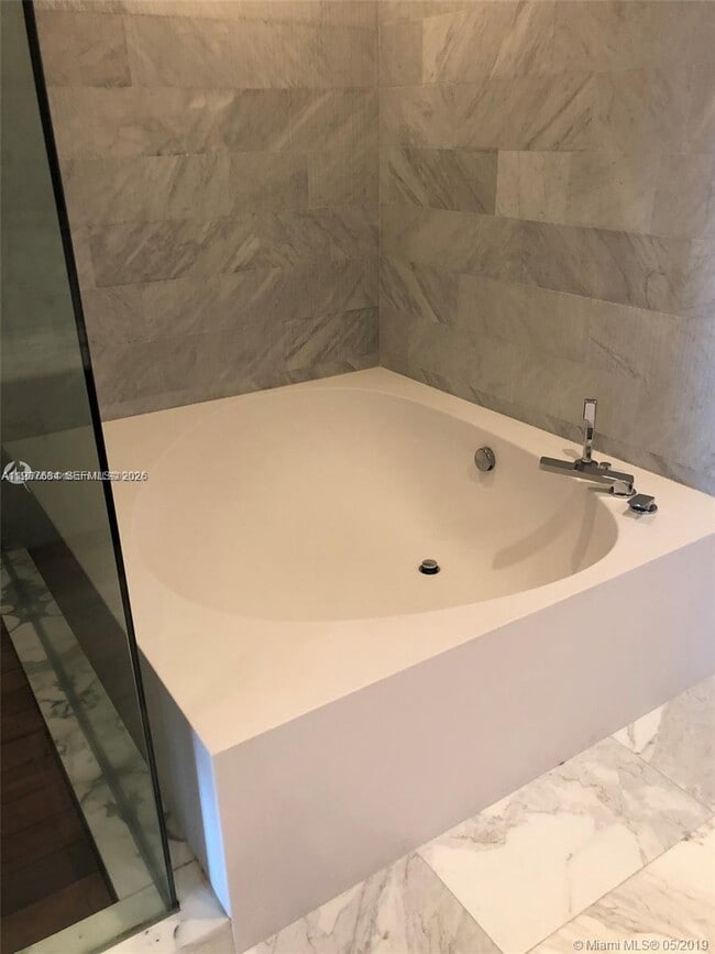 Building Photo - 10203 Collins Ave