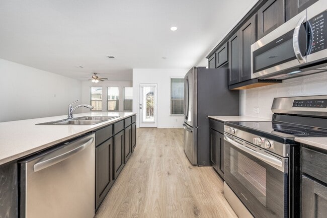 Building Photo - Brand-New 4 Bed | 2.5 Bath | Private Fenced Yard | Over 2,000 Sq Ft