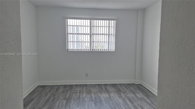 Building Photo - 19390 Collins Ave