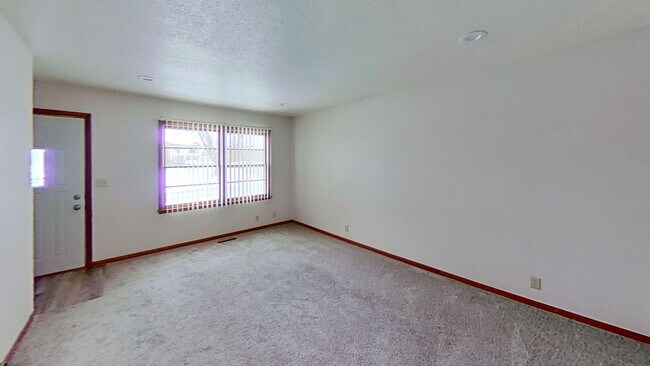 Building Photo - Updated two bedroom ranch duplex with partial basement finish, detached garage, close to mall/sho...