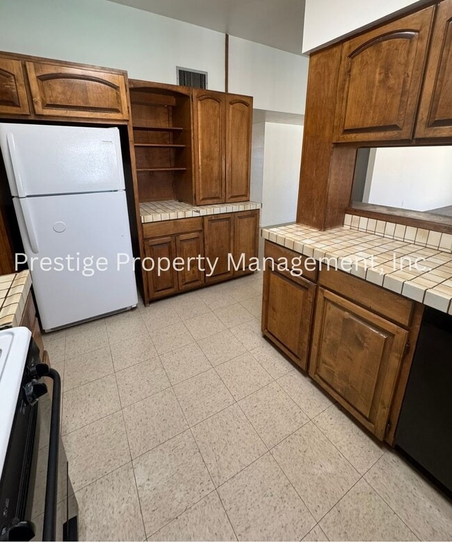 Building Photo - Stop Your Search! This 3/2+ Bonus Room is Centrally Located with a Pool and More!