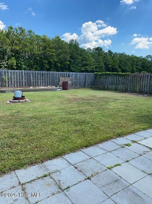 Building Photo - 206 Red Carnation Dr