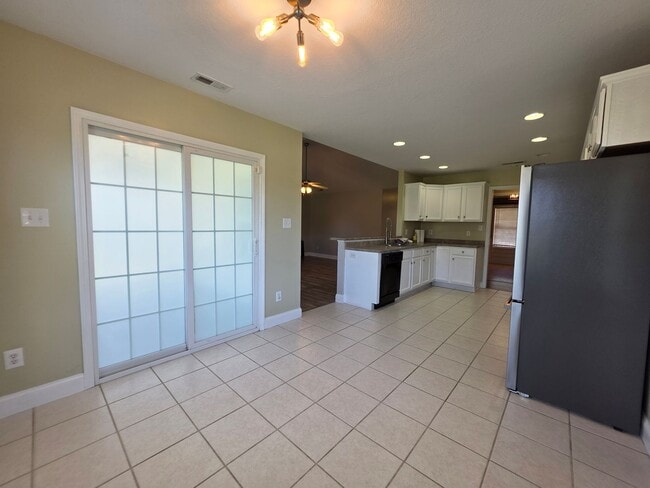 Building Photo - Spacious 4-Bedroom Bryan Farms Beauty with Bonus Suite, Large Fenced Yard & RV/Boat Parking!