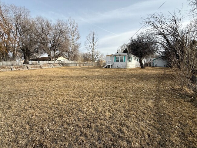 Building Photo - 2 Bedroom 1.5 Semi-Rural Mobile Home with ...