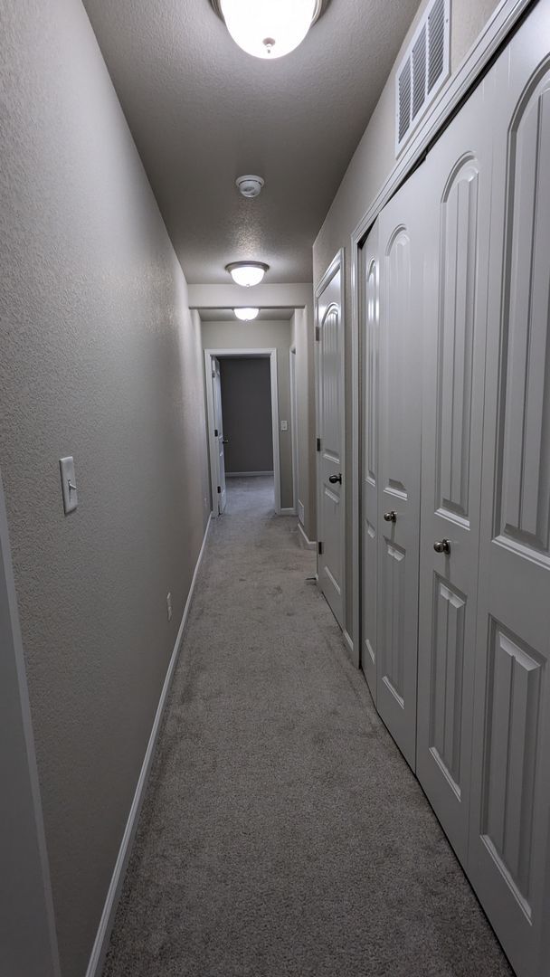 Building Photo - NEWER END UNIT TWO STORY TOWNHOME WITH A/C...