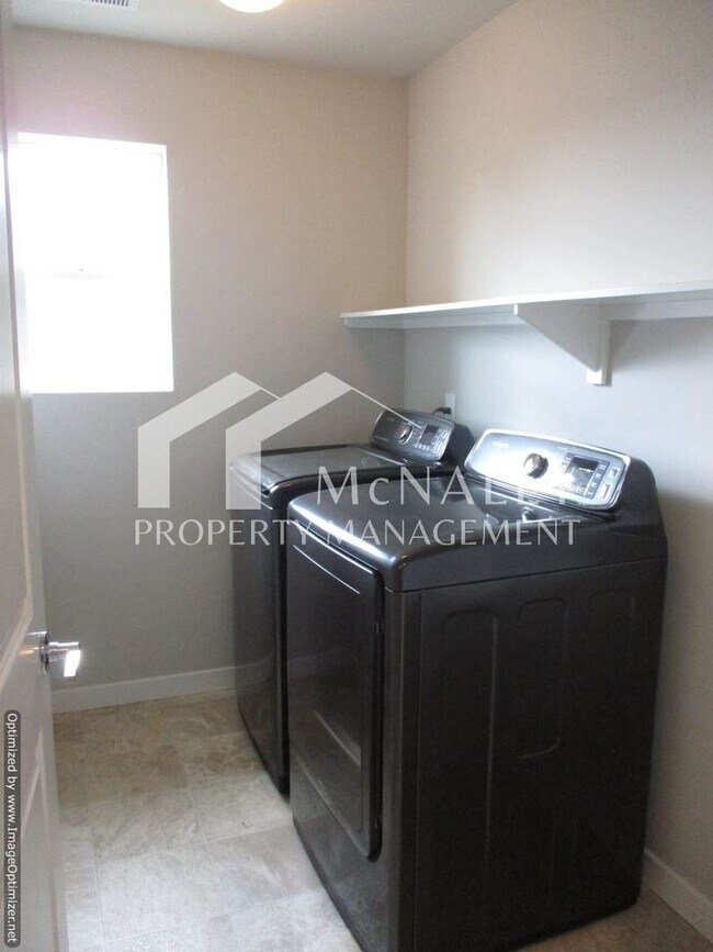 Building Photo - Spacious 4-Bedroom Home with Modern Comforts
