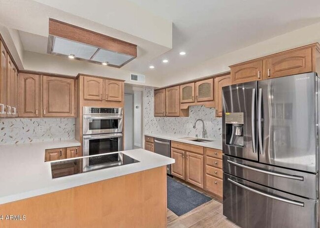 Building Photo - 8737 E Sage Dr