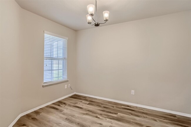 Building Photo - This well-maintained 4 bedroom home is located in a quiet neighborhood that has a community park ...