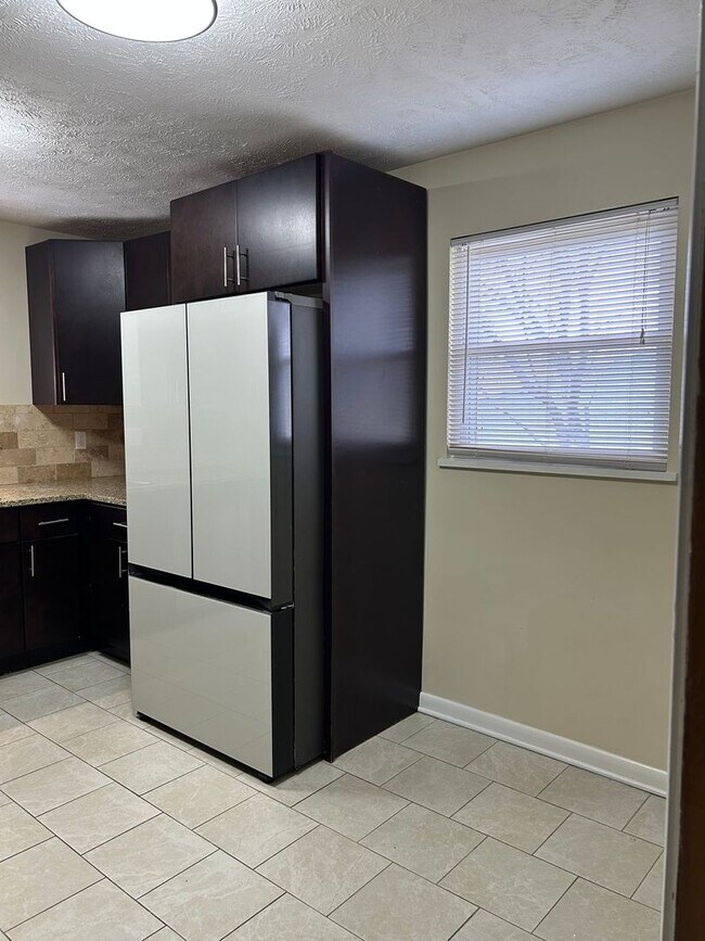 Building Photo - Brick Ranch for Rent in Highland  HTS close to the freeway