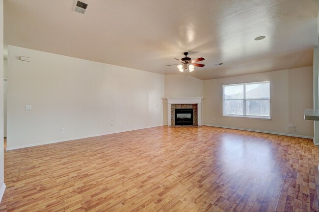 Building Photo - Spacious 4-Bedroom Home with Corner Firepl...