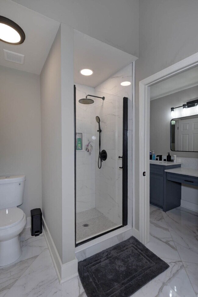 Building Photo - COMING SOON · Designer Renovation · Covered Deck Pavilion · 2-Car Garage · Lawn Care Included
