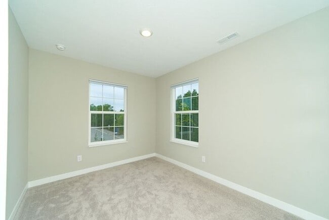 Building Photo - Beautiful Brand New,Townhome in Great Carm...