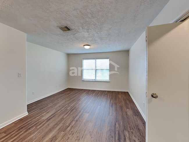 Building Photo - 9116 Dolphin Cir