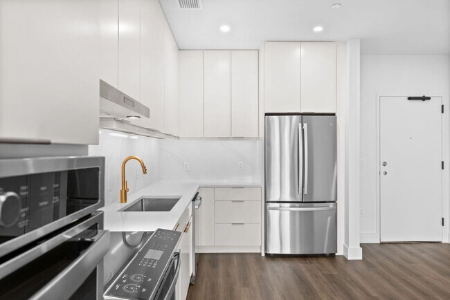 Building Photo - 2 Bedroom Corner-Unit with Wooded Balcony ...