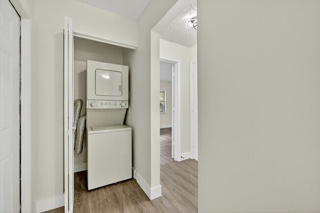 Building Photo - Outstanding one-bedroom, one-bath property with water views and upgrades.