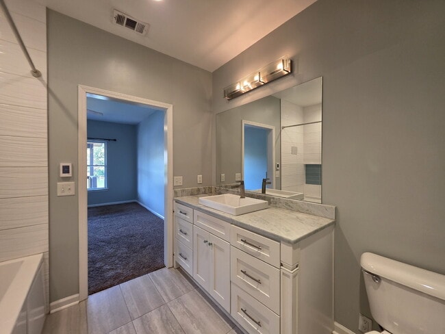 Building Photo - Lakefront 3BR/3BA with Covered Deck, Garage & Community Pool