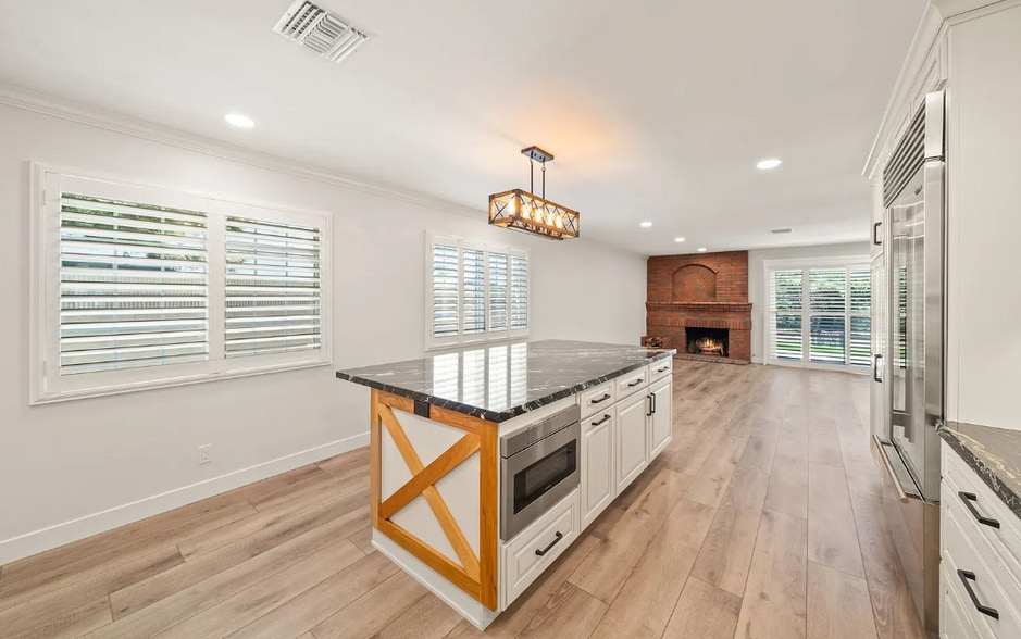 Kitchen Area with Island - 5441 Richmond Ave