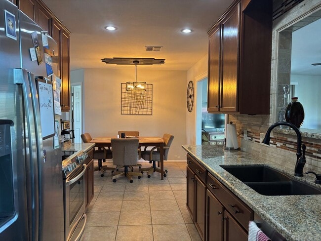 Building Photo - Welcome to this stunning updated 2-bedroom, 2-bathroom home on a lake located in the vibrant comm...